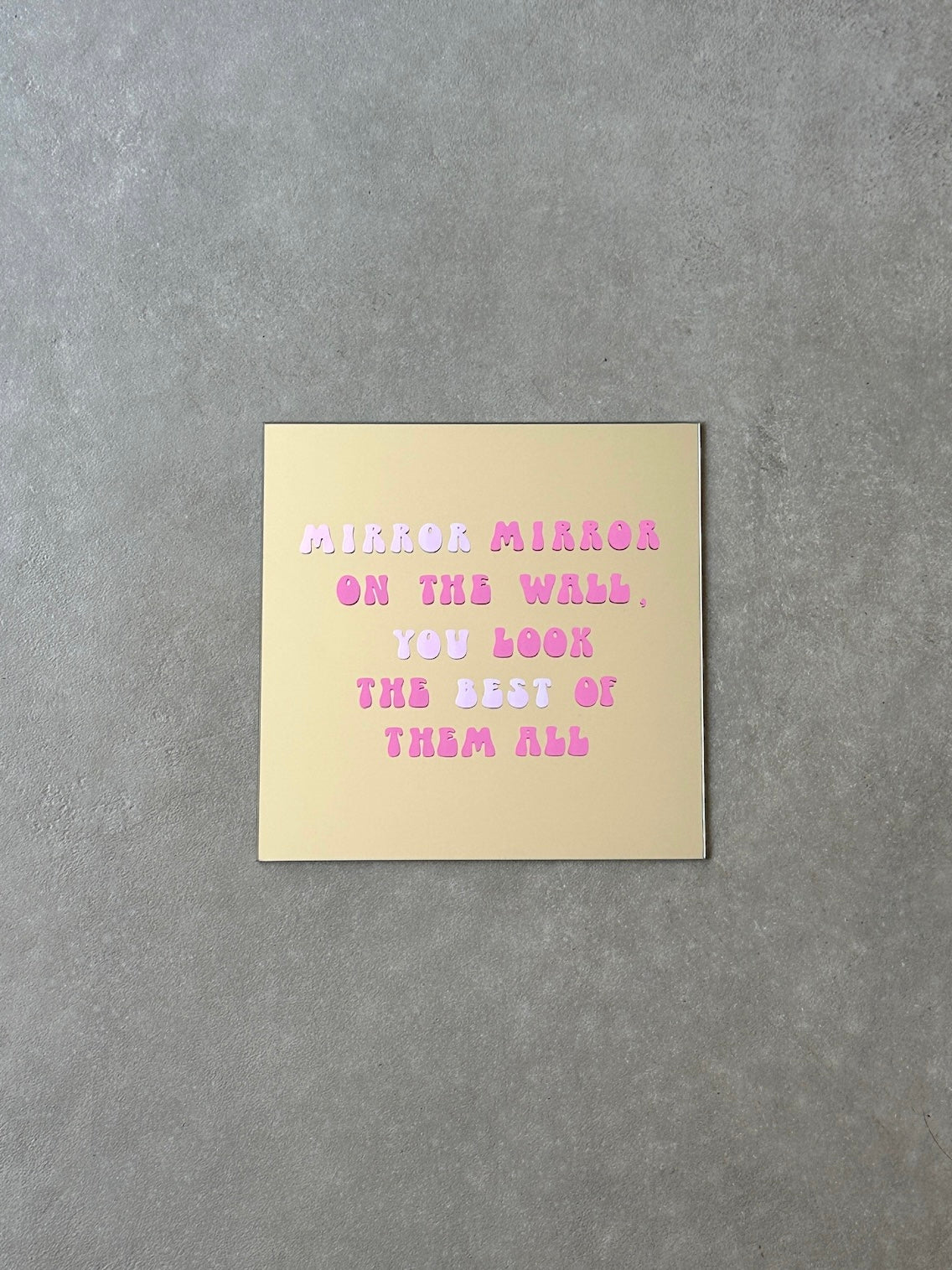 On the wall mirror pink holo