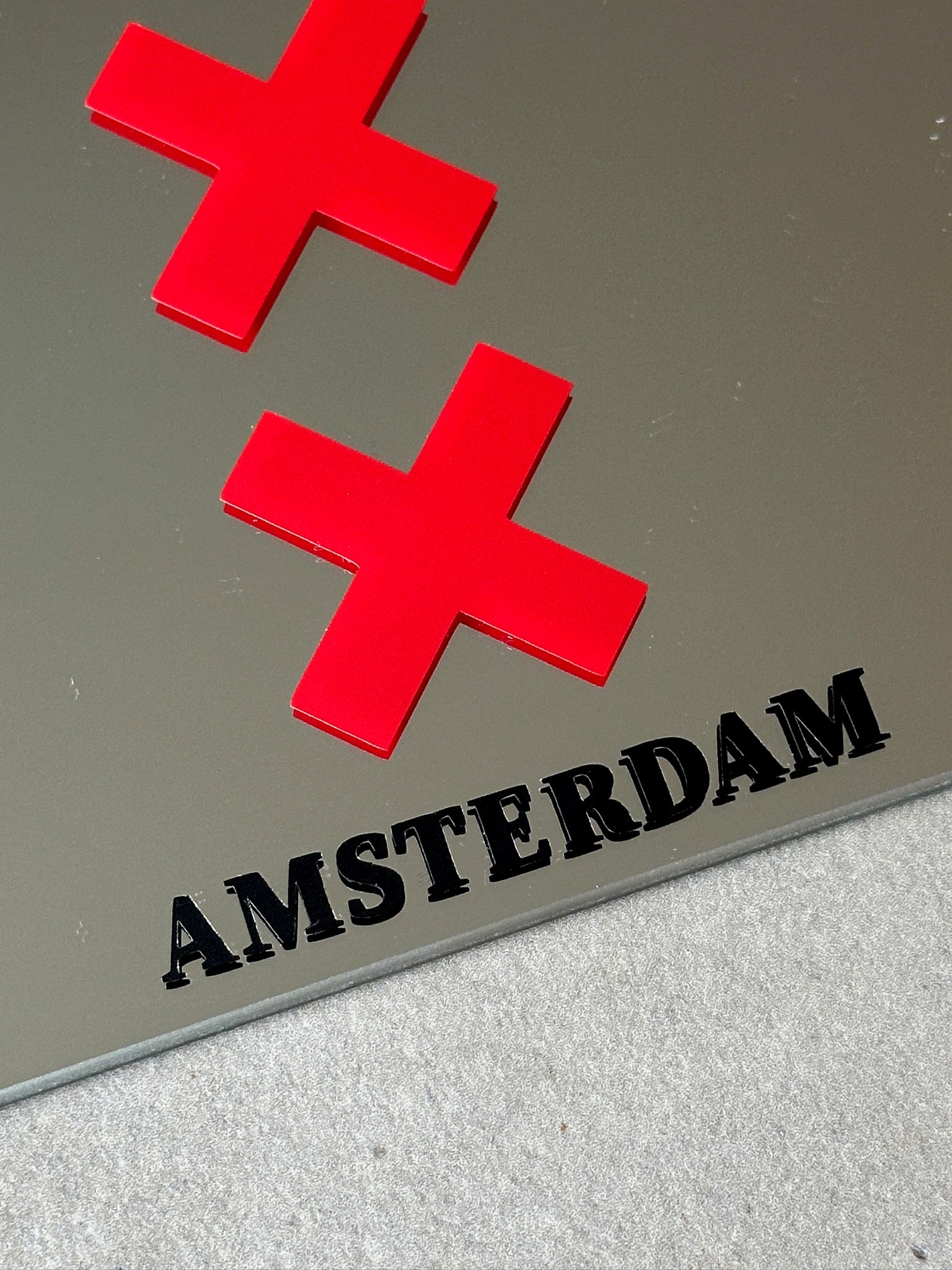 Amsterdam crosses with text mirror red