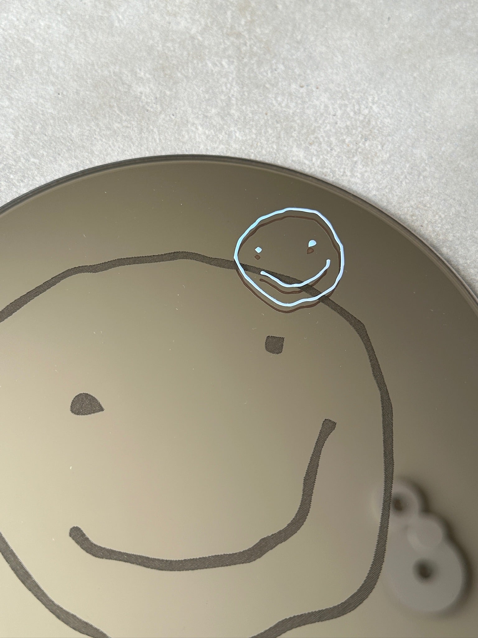 Smile holographic mirror