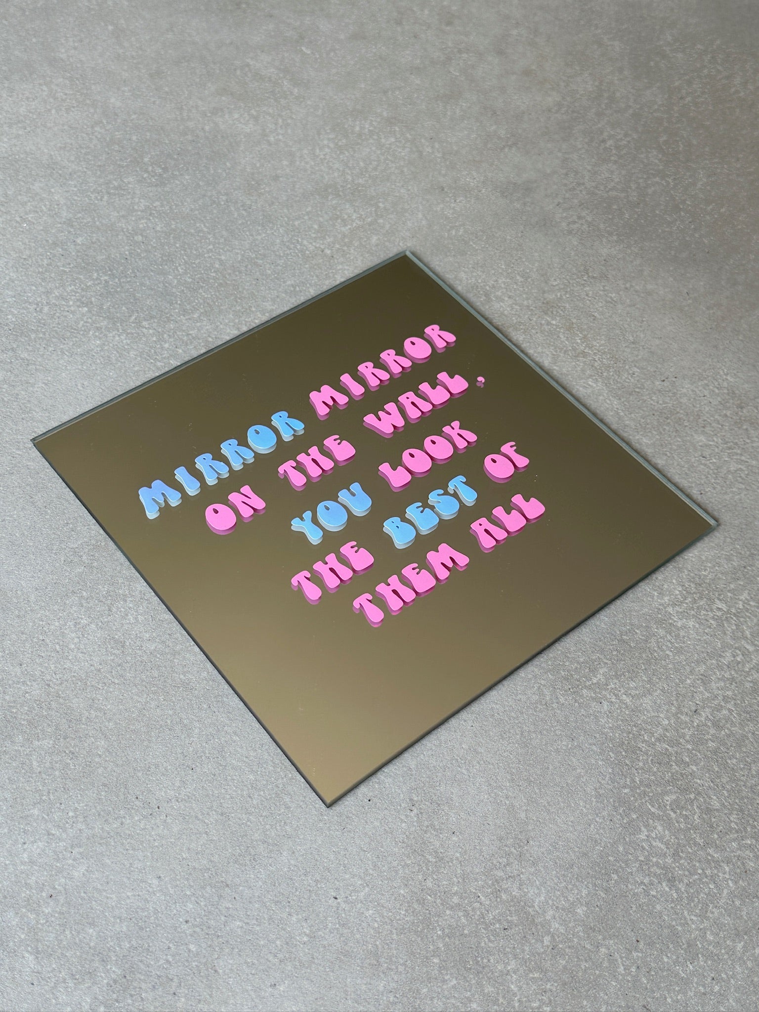 On the wall mirror pink holo