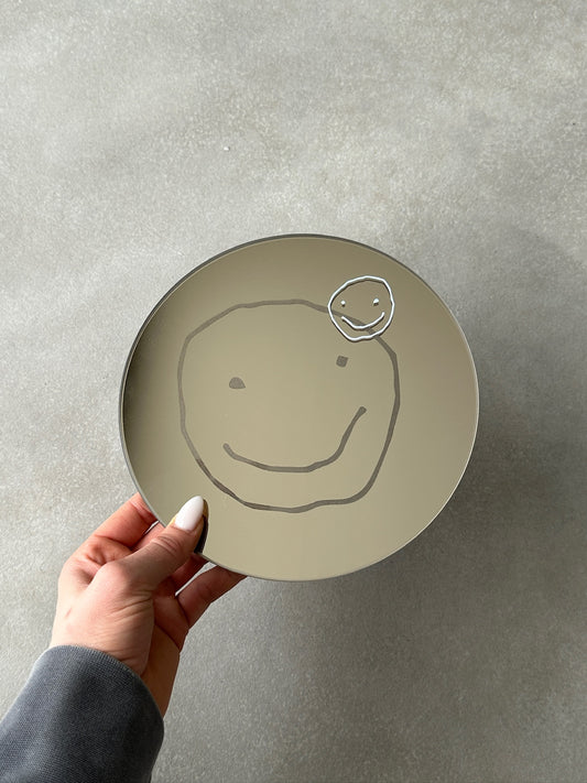 Smile holographic mirror