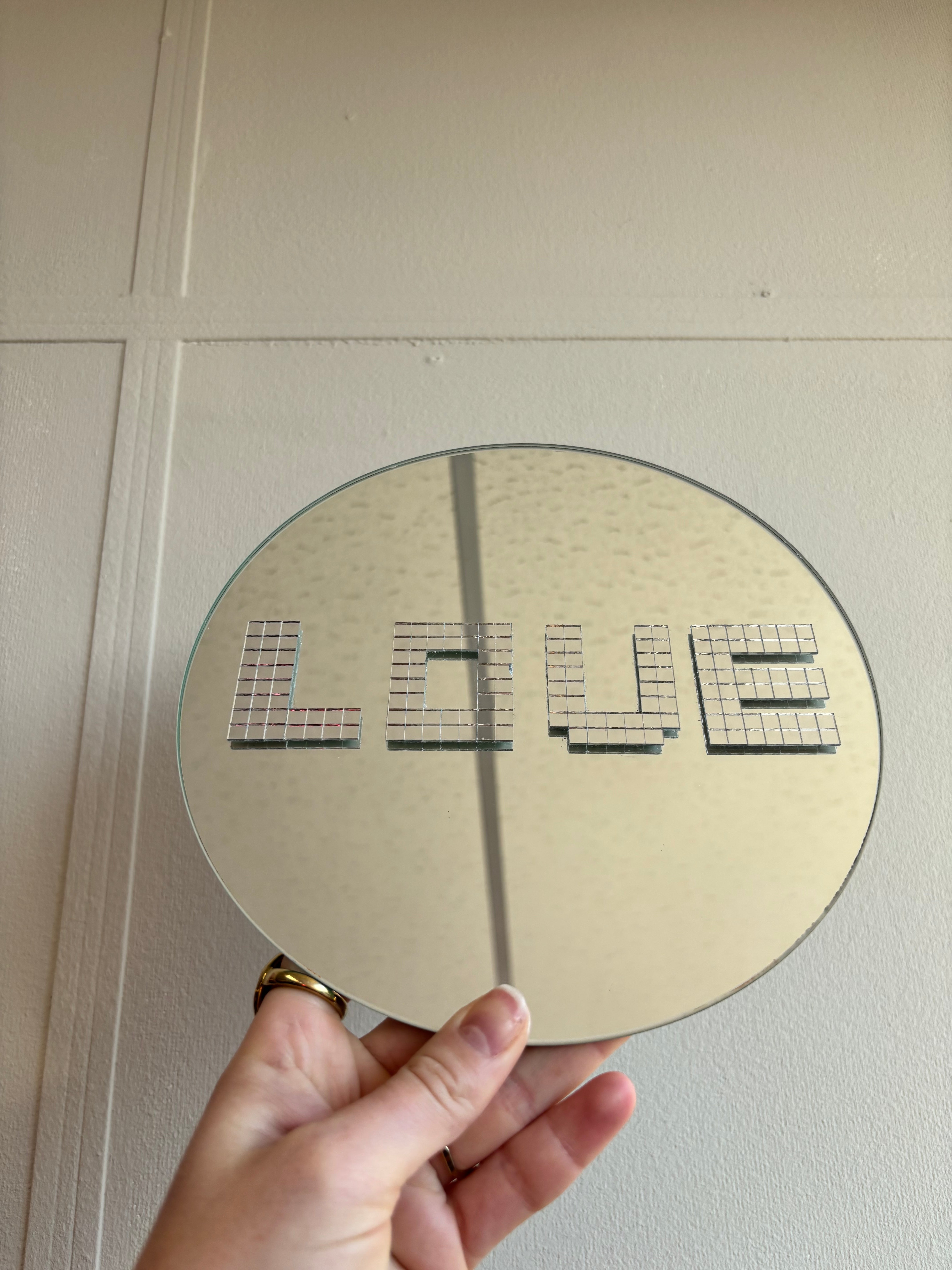 Damaged disco Love round mirror