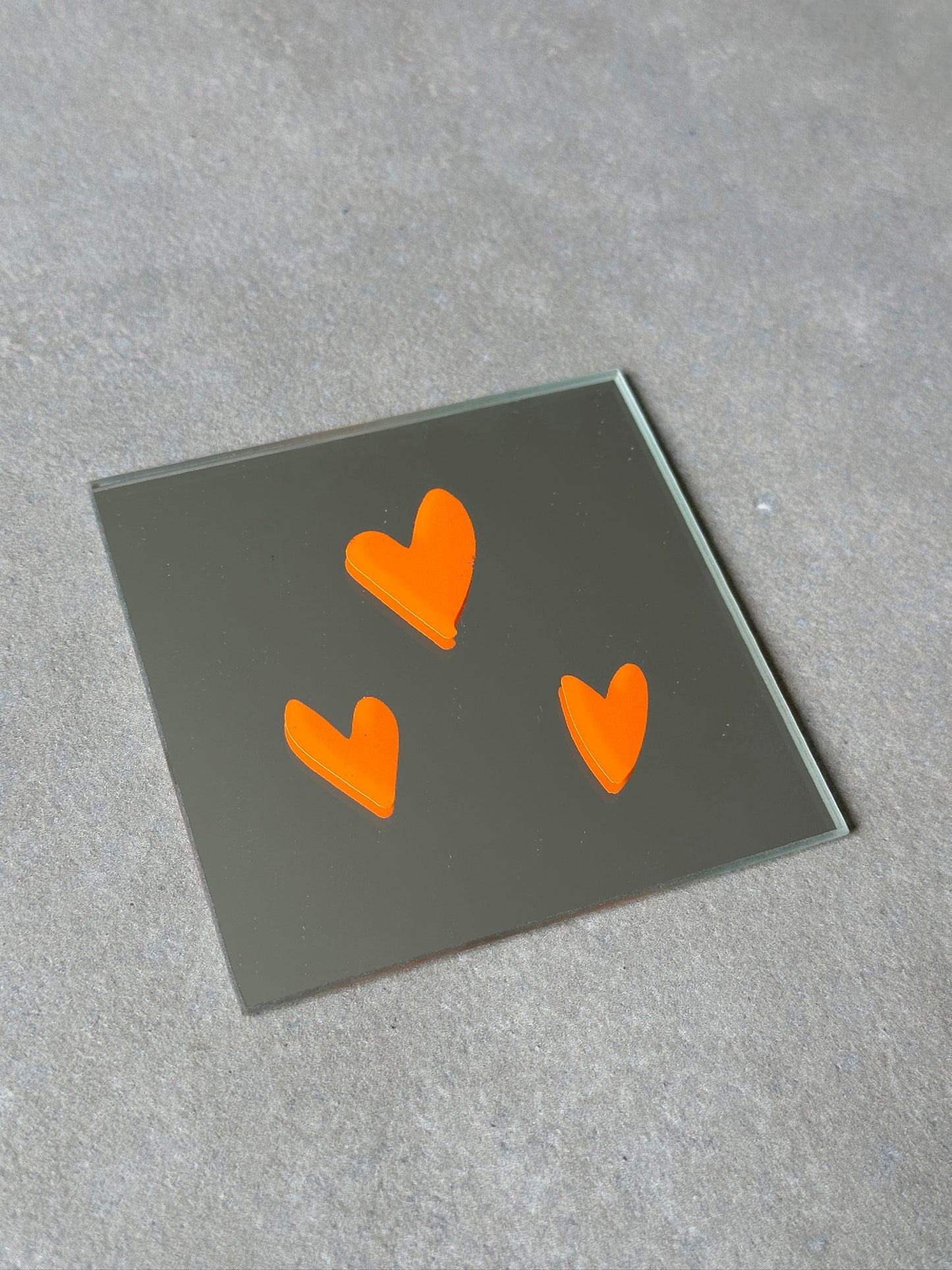 Hearts square orange mirror